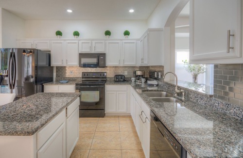Lake Berkley Villa | Lakeside house, huge south facing pool with spa, lake view, Disney at 8 miles