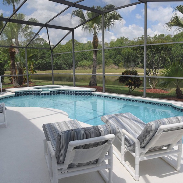 Delightful modern 4 bed, 3 bath villa with private pool/spa and lake view. in Kissimmee