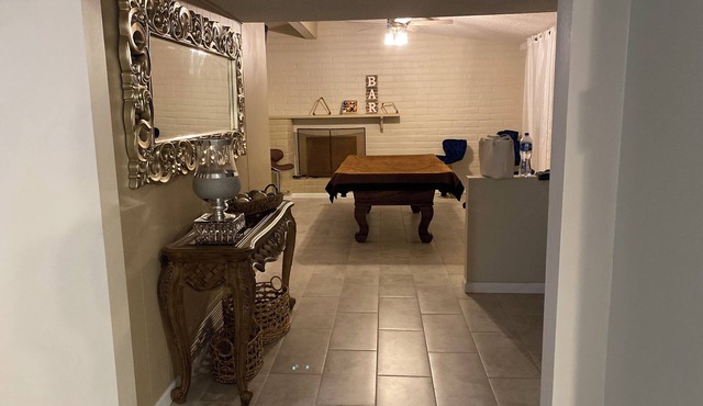 Charming 4-bedroom house with AC, WiFi, and play areas in pleasant Tucson in Tucson