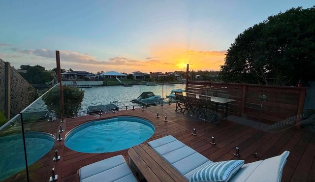 Luxury Waterfront Retreat: Pet friendly Canal Home with Jetty on Bribie Island! in Bongaree