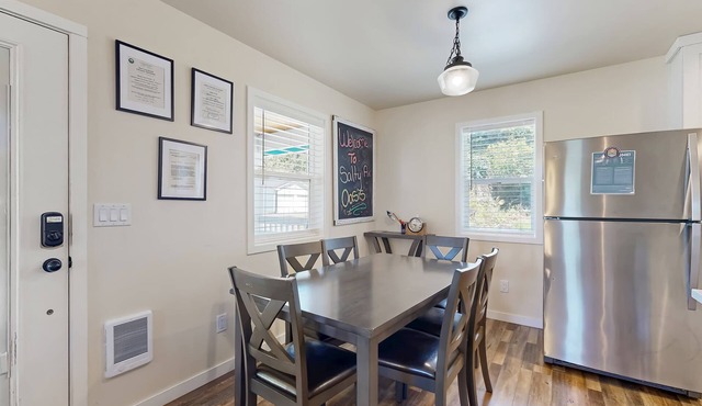 Modern Beach Cottage with a covered patio fire pit grill and easy beach access in Rockaway Beach