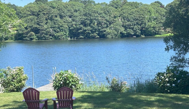 NEW LISTING! Pond Front 4BD-A/C, Deck, Hot Tub & Dock, Right on Queen Sewell Pond in Buzzards Bay
