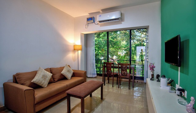Relaxing 1BHK at Vagator, French windows in Vagator