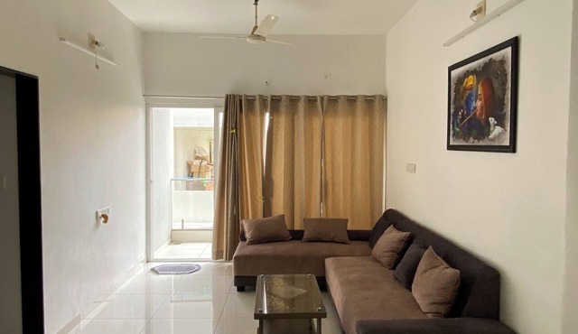 Work-Friendly 2BHK for Long Stays, Kitchen, Quiet Residential Area & Parking in Vadodara