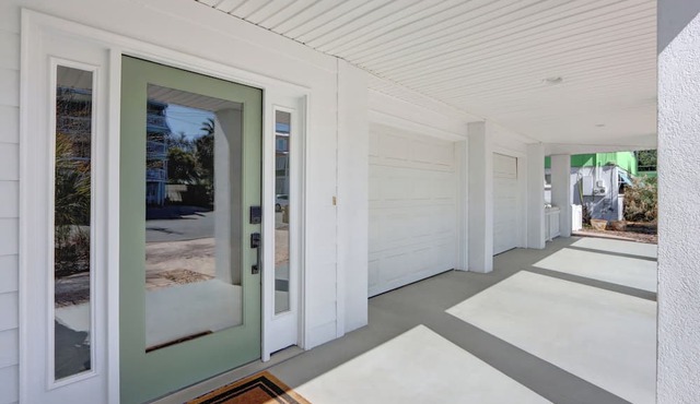 Ocean views with two huge double covered porches to enjoy the breeze! in Tybee Island